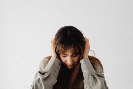 Tinnitus en holistische therapie bij oorsuizen